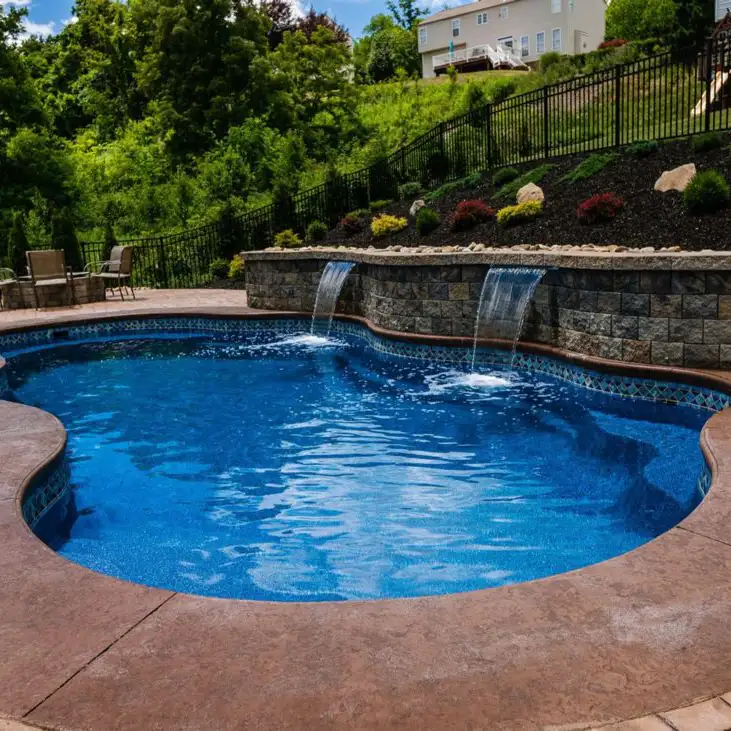 free form shape in-ground swimming pool with water features - Decatur, IL