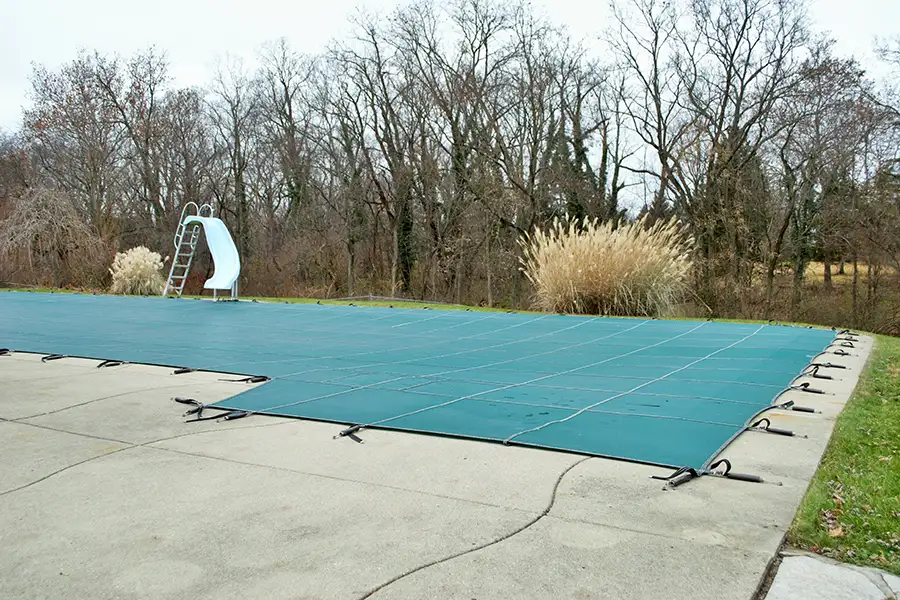 Pool closed for the winter season, woven mesh pool cover - Decatur, IL