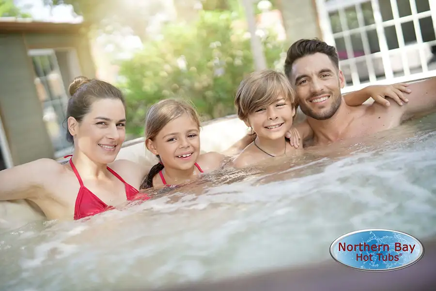 young family enjoying Northern Bay Hot Tubs - Decatur, IL